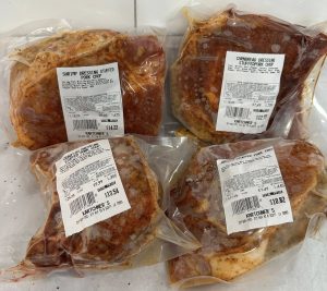 Stuffed Pork chops in vacuum sealed bags with labels