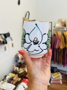 Hand painted stemless wine glass with magnolia painted and gold rim