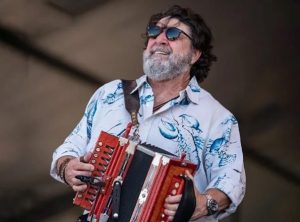 Wayne Toups playing accordion on stage