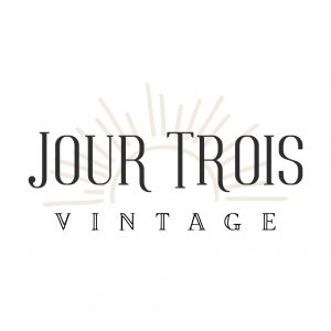 Jour Trois logo with sunrise graphic in the background