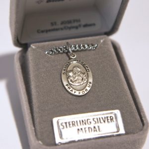 religious medal in a jewelry box