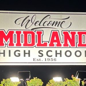 Midland High School sign between two pillars